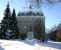 View of the east elevation of the Convent of the Sisters of the Holy Names of Jesus and Mary, St. Pierre-Jolys, 2005; Historic Resources Branch, Manitoba Culture, Heritage & Tourism, 2005