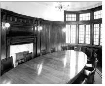 Oval Boardroom after restoration, showing wood paneling and bay window; OHT