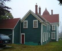 Rear elevation showing addition and carriage house, Lovitt House, Yarmouth, 2004.; Heritage Division, NS Dept. of Tourism, Culture and Heritage, 2004.