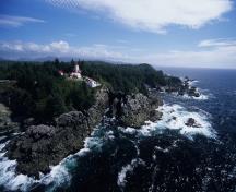 Aerial view of Cape Beale Lighthouse showing its setting on the treacherous coastline of Vancouver Island, 60 metres above the Pacific Ocean.; Parks Canada Agency | Agence Parcs Canada