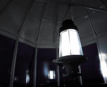 View of Île Verte Lighthouse's lantern in operation; Agence Parcs Canada | Parks Canada Agency, Valérie Busque, 2009.