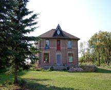 Primary elevation, from the east, of the house on the Armstrong Farm Site, Rossburn area, 2006; Historic Resources Branch, Manitoba Culture, Heritage and Tourism, 2006