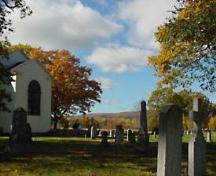 View of burial ground and rear elevation including chancel window, Old Holy Trinity Church, Middleton, 2005.; Courtesty of Old Holy Trinity Charitable Trust.