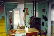 View of the kitchen of Wilfrid Laurier House, showing the elements of the interior that contribute to the idealized vision of a late 19th-century middle-class vernacular house at the time of restoration, 1992.; Parks Canada Agency / Agence Parcs Canada, 1992.