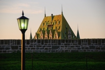 General view of the Québec Citadel's walls in 2007 with the Château Frontenac in background.; Parks Canada Agency | Agence Parcs Canada