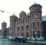 Corner view of the Halifax Drill Hall, showing the Cunard Street façade, 1990.; Department of National Defence/ Ministère de la Défence nationale, 1990.