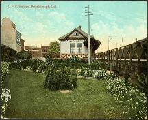 Historic postcard view from the west showing the landscaped grounds of the station – c. 1915; trainweb.org, 2005