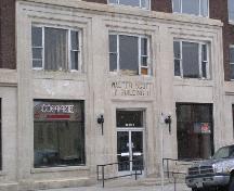 Close-up of main entryway featuring stone detailing and name plate for the Walter Scott Building, 2006; Government of Saskatchewan, Brett Quiring, 2006