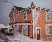 Exterior photo of Hodge Brother's Premises in Twillingate, showing the front facade under restoration, 2006.; HFNL 2006