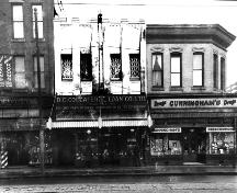 The two-storey BC Collateral and Loan renovated to an Art Deco appearance by 1934.; Vancouver Public Library 6176