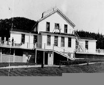 Exterior front facade view of Bonne Bay Cottage Hospital, Norris Point, Newfoundland, 1953.; Boyd Bugden