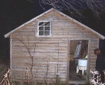 Exterior front view of Ford sheep house/shed, Ford Property,  Jackson's Arm, NL, 2005/11.; HFNL/Lara Maynard 2005.