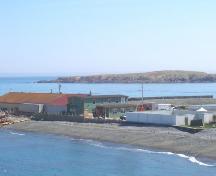View of the Bernard Kavanagh Premises, Ferryland, NL looking southeast from the Southern Shore Highway. Photo taken May 2006. ; HFNL/Andrea O'Brien 2006