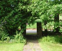 Stone gates that lead to 814 Main Street.; Carleton County Historical Society
