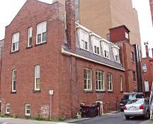 One of the Central School Buildings, moved to Church Street from Alma Street in 1898, is still distinguishable at the rear of the Salvation Army Citadel.; Moncton Museum