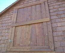 Close up view of the loft door, Burgess Fishing Property.  Photo taken September 8, 2005.; HFNL 2005