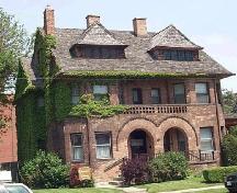 This massive Richardsonian Romanesque style residence was built circa 1890.; City of Windsor, Nancy Morand