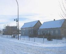 View of the House, Barn and Church of Swift Current Mennonite Heritage Village.; Clint Roberston, 2005.