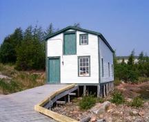 View of front facade of the Grenfell Shed and Wharf in Mary's Harbour, view looking landward. ; Town of Mary's Harbour 2006