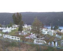 View looking south of Immaculate Conception Cemetery, Cape Broyle, NL. Photo taken July 2006.; HFNL/Andrea O'Brien 2006