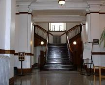 Court House foyer featuring the base of the double staircase, 2004.; Government of Saskatchewan, Bernie Flaman, 2004.