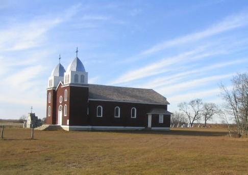 Cairn, church and cemetery.
