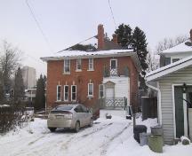 View of the rear of the Hugh Duncan Residence, facing west and off the lane leading south from 86 Avenue (March 2006); City of Edmonton, 2006