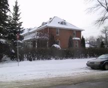 View of the front and side of the Hugh Duncan Residence from the intersection of 104 Street and 86 Avenue (March 2006); City of Edmonton, 2006