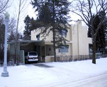 View of the Hyndman Residence, Edmonton looking toward the front entrance and carport facing west along 136 Street (January 2005); City of Edmonton, 2005