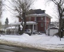 View of the front (north) and west facades of the Margaret Martin Residence, that face 84 Avenue (March 2006); City of Edmonton, 2006