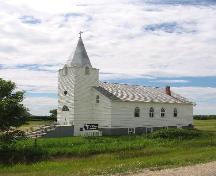 Front and side elevations, showing symmetrical, Gothic-arched windows, 2005.; Kyle Zelmer, 2005