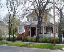 View of front facade featuring veranda, 2005.; Candice Lee, 2005.