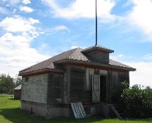 View of front façade highlighting the front entryway, dormer and flagpole, 2006.; Saskatchewan Architectural Heritage Society, Kyle Zelmer, 2005