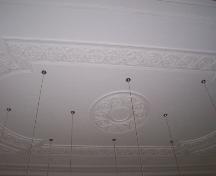 Detail of plaster ceiling in main portion of bank.  Ceilings are very high and long, pendulum lights hang from the decoration.  Photo taken November 8, 2006.; HFNL/ Deborah O'Rielly 2006