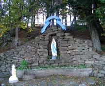 The Grotto and the Calvary - the Grotto erected in 1878.; Village of Saint-Louis-de-Kent