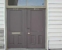 This photograph shows the old double wooden doors at the south entrance, 2004; City of Saint John