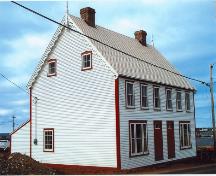 Exterior side and front view of James Ryan Tenement House, Bonavista, circa 2004, after restoration; HFNL 2004
