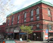This contextual photograph shows the building's occupancy on Germain Street, 2004; City of Saint John