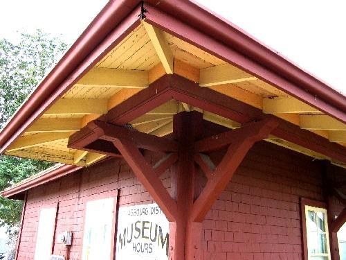 Close-up of overhanging eaves and supporting brack
