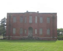 Front facade of the Red Brick Schoolhouse highlighting the materials and form of the building, 2006; Government of Saskatchewan, Brett Quiring, 2006.