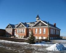 View of Old Morse School featuring the three symetrically-arranged gabled end wings, 2006; Government of Saskatchewan, Lindy Thorsen, 2006.