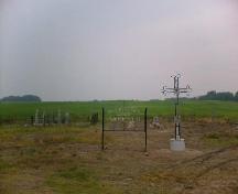 Signage and headstones at St. Mary's Greek Catholic Cemetery, 2006; Dwayne Yasinowski, 2006.