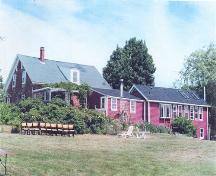 Parker Farm rear elevation, summer kitchen and addition.; NS Dept. of Housing and Municipal Affairs, 1999. Photographer: Nicholas Holman.
