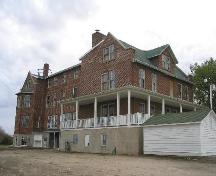 View from rear, showing window placement and verandah detailing, 2004.; Government of Saskatchewan, Jennifer Bisson, 2004.