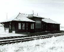 Corner view of Canadian Pacific Railway Station, showing both the back and side façades.; Great Plains Research, B. Potyondi, April 1991.