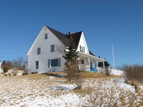 Front and west side view from highway