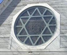 Stained glass rose window, Trinity Anglican Church, Digby, Nova Scotia, 2004.

; Heritage Division, NS Dept. of Tourism, Culture and Heritage, 2004.