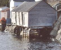 Photo view of water side and back gable end of Roland Chippett Stage, Leading Tickles, 2006.; Town of Leading Tickles/ HFNL 2007