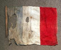 Assumption Hall - remnants of an Acadian flag found in the walls of the building; Centre for Acadian Studies