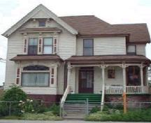 An ornate wrap-around porch enhances this Queen Anne Revival style home built in 1891.; City of Windsor, Nancy Morand